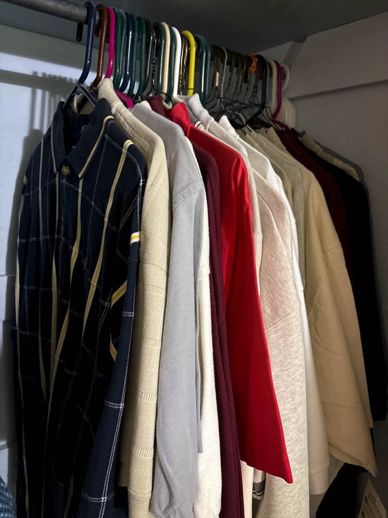 Hanging Clothing Items Including Shirts and Jackets