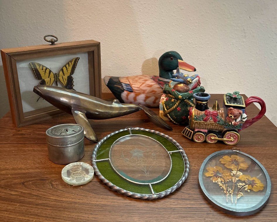 Decorative Items including Whale, Butterfly Display, and Christmas Teapot