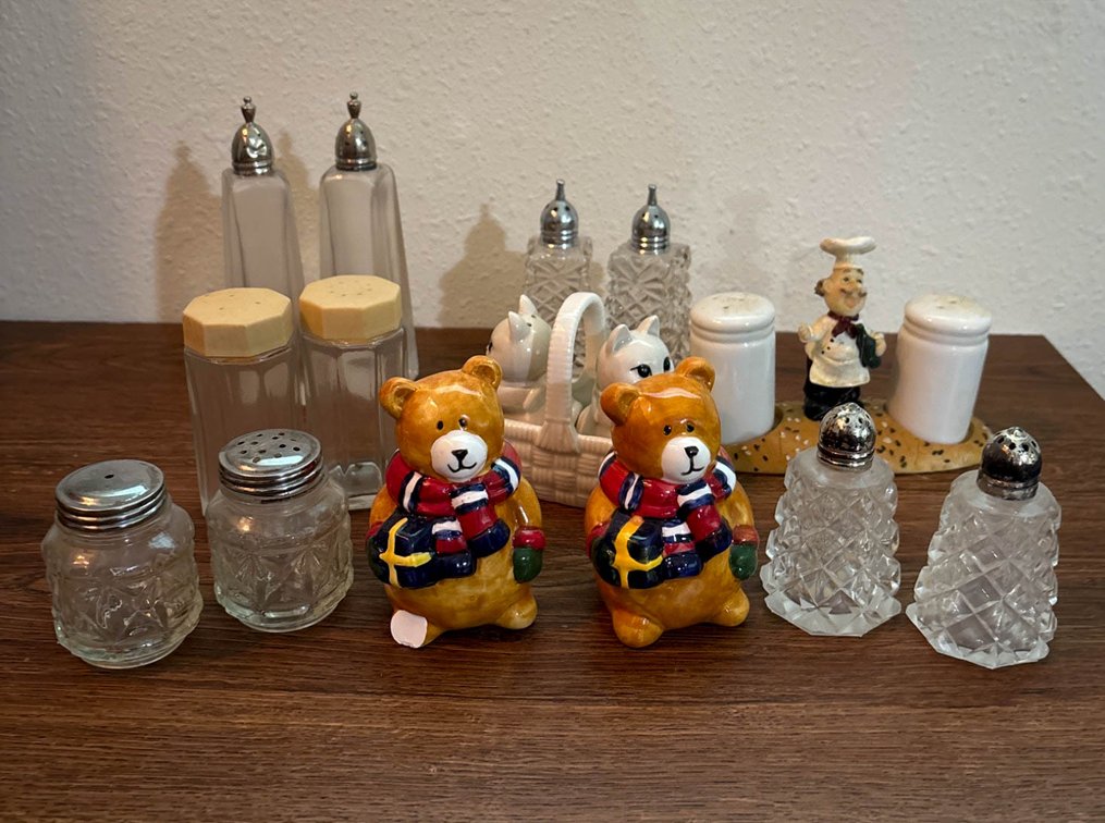 Salt and Pepper Shakers of Various Styles and Materials