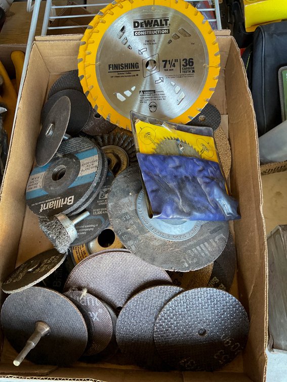 Box Lot of Assorted Saw Blades, Grinding Wheels, and Accessories
