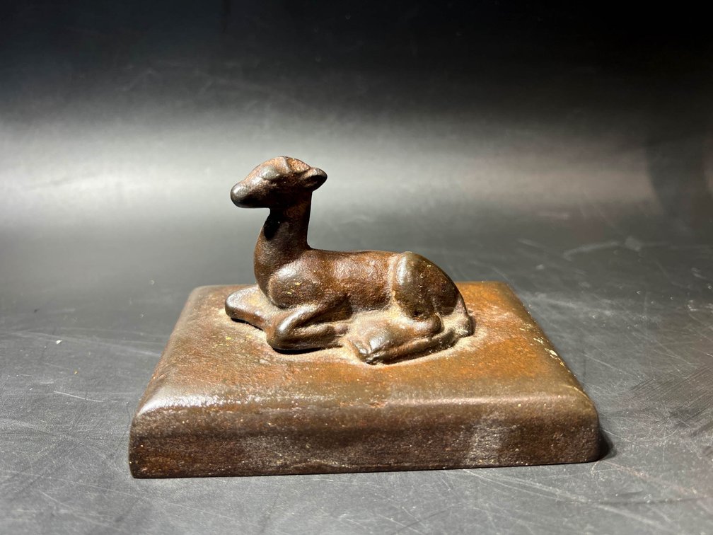 Heavy Metal  Sculpture of a Reclining Deer on Rectangular Base