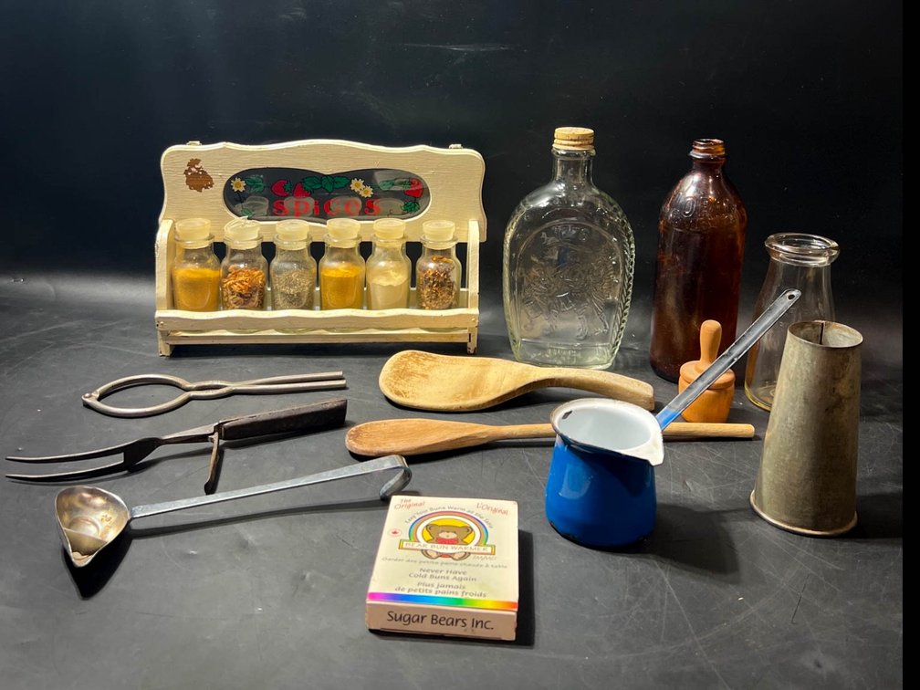 Kitchen Tools With Spice Rack, Glass Bottles, and Utensils