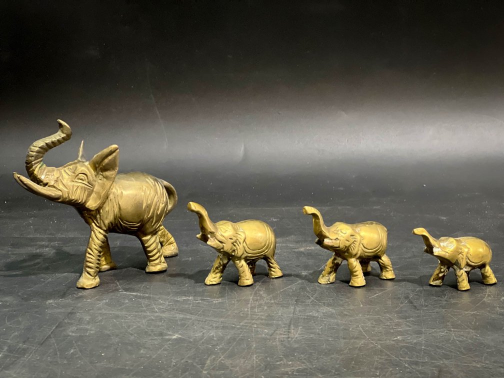 Four Brass Elephant Figurines with Graduated Sizes