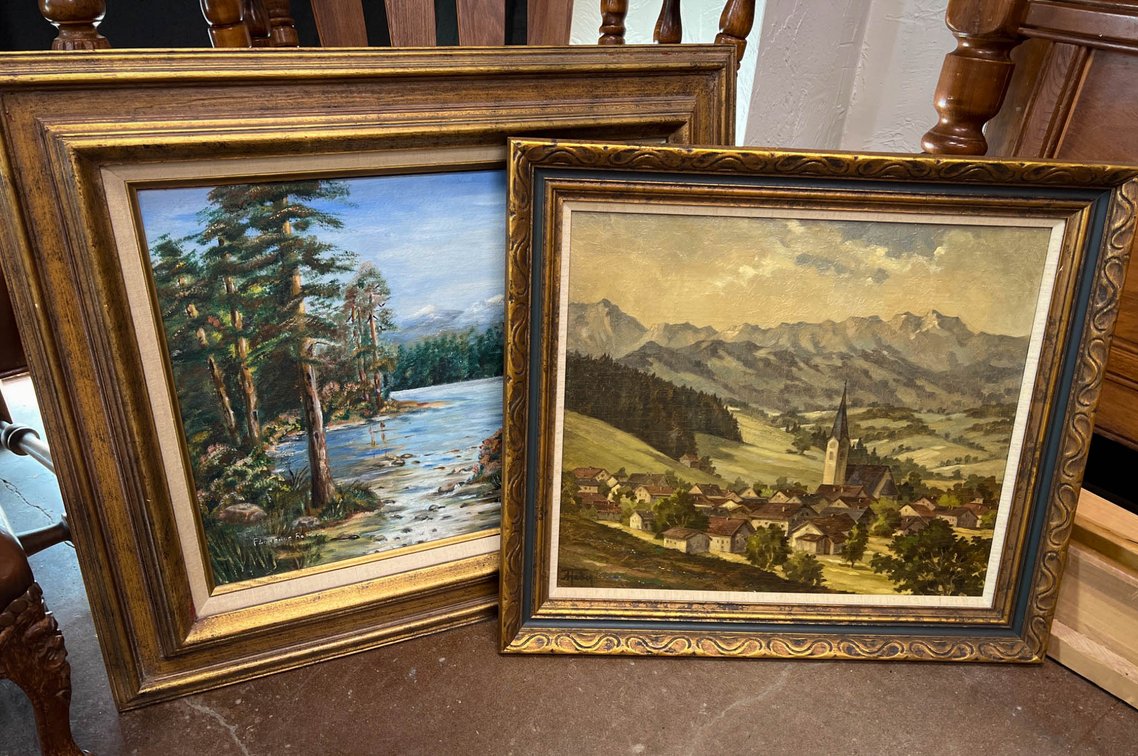 Framed Landscape Paintings Depicting Forest and Village Scenes