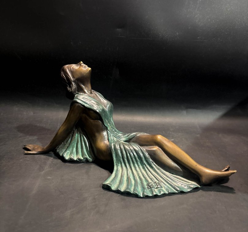 Bronze-Colored Reclining Female Figurine in Flowing Dress