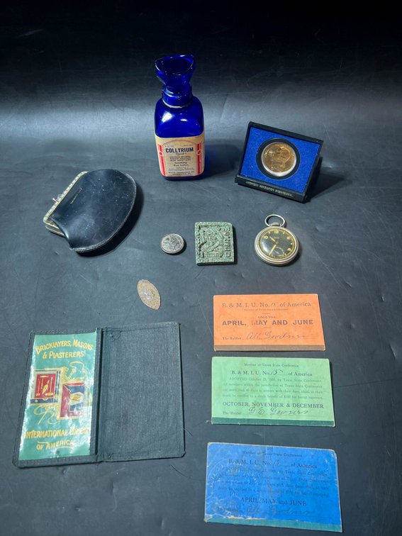 Collectible Items Including Union Cards, Pocket Watch, and Collyrium Bottle