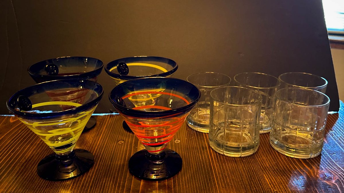 Four Colored Swirl Blue Stem Glasses and Five Clear Tumblers
