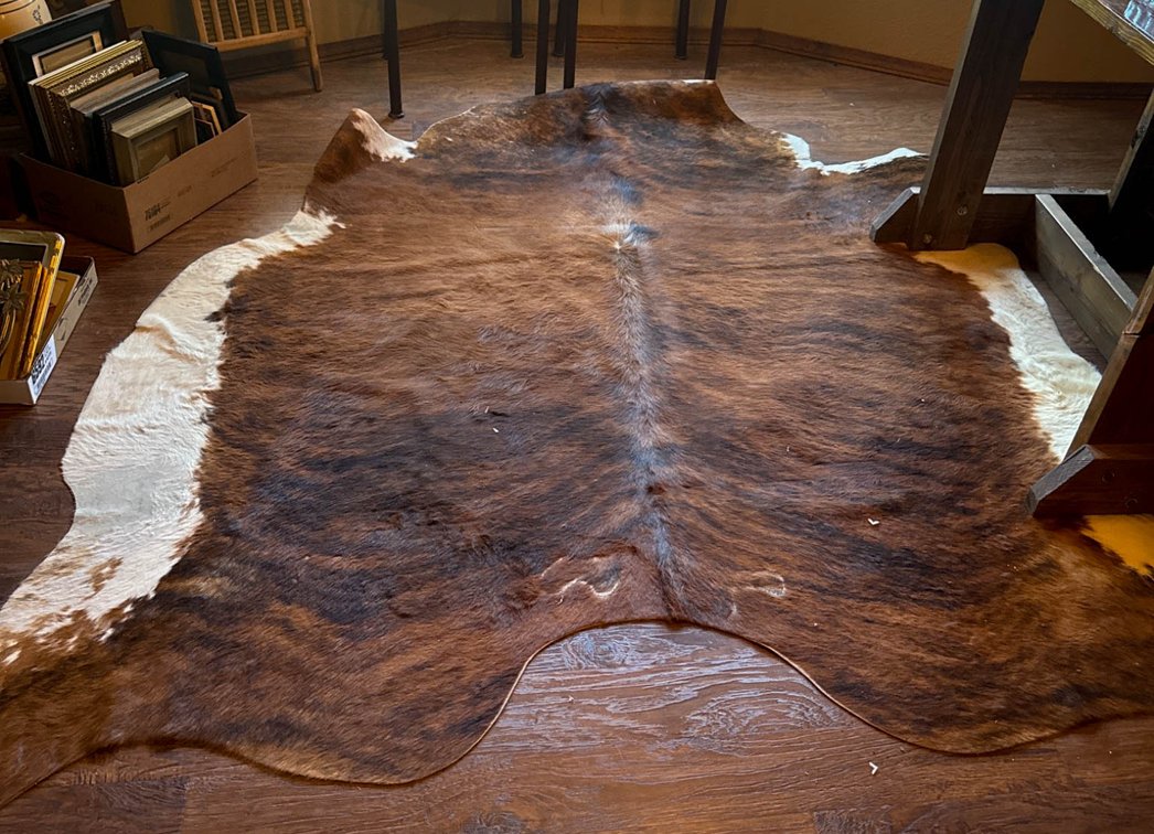 Large Brown and White Cowhide Rug, 90 x 84 Inches