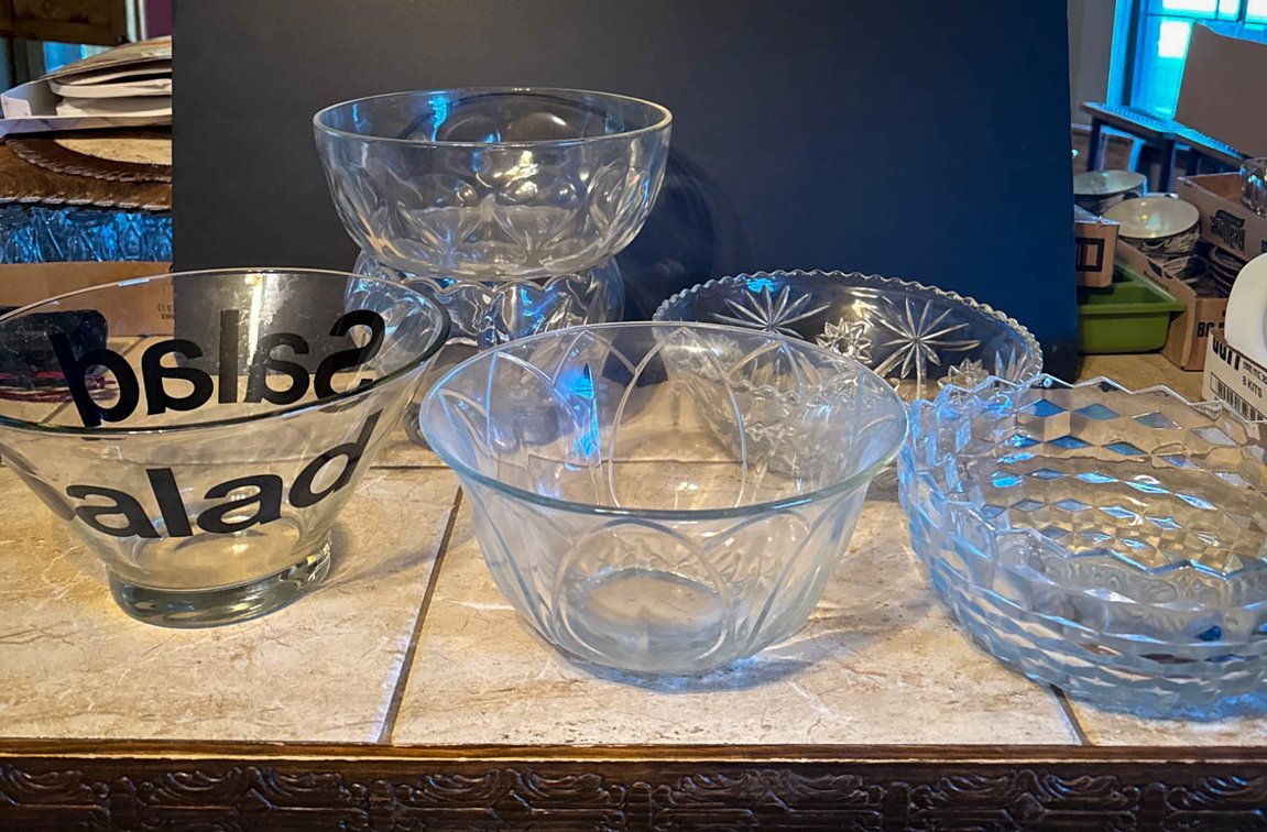 Five Clear Glass Bowls With Various Designs