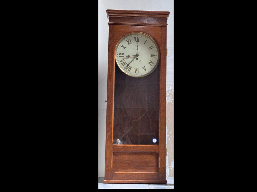 Oak Wall-Mounted Clock With Roman Numeral Dial, 46" X 17"