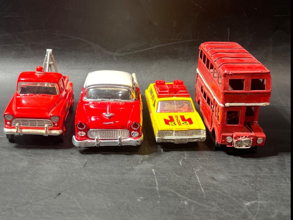 Four Vintage Die-Cast Toy Vehicles