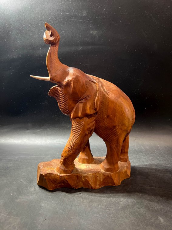 Hand-Carved Wooden Elephant Sculpture with Raised Trunk