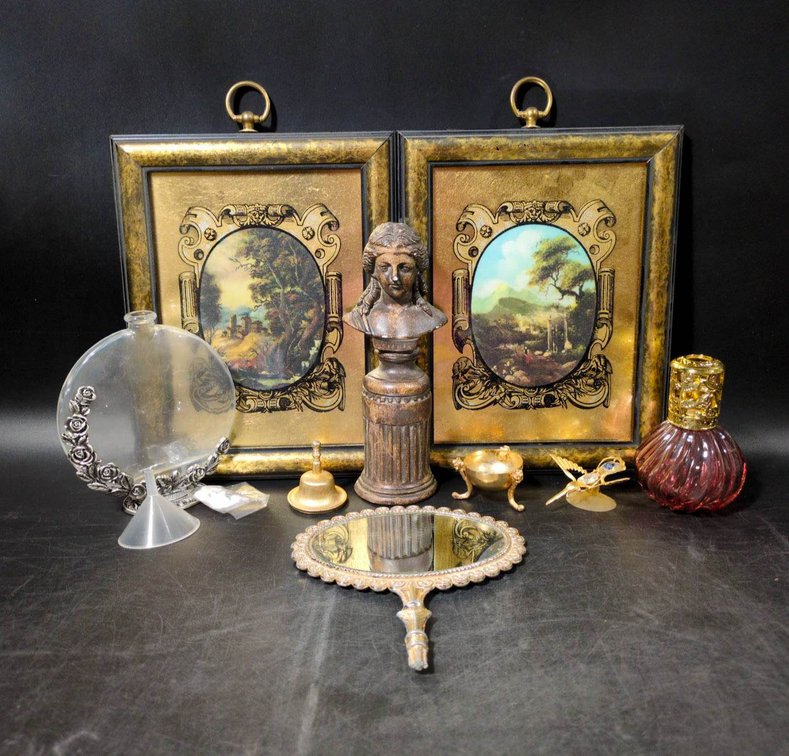 Decorative Items Including An Oil Lamp, Perfume Bottle, Frames, and Brass Pieces 