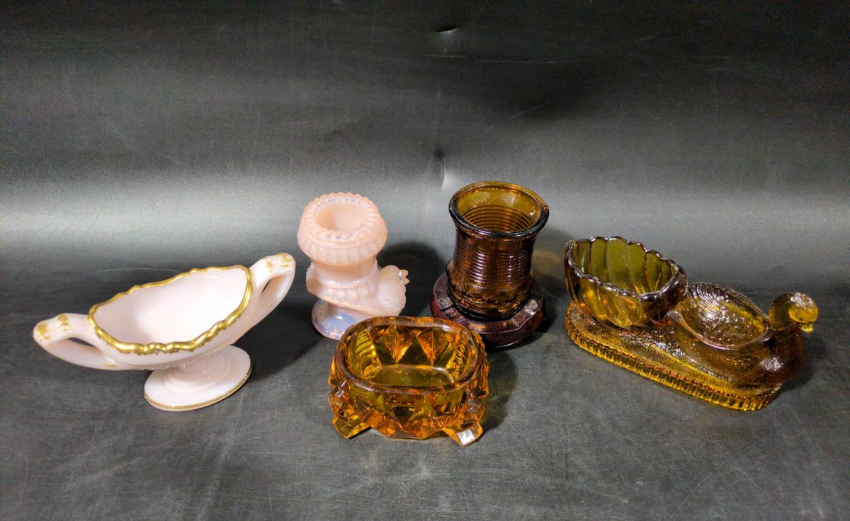 Five Decorative Glass Pieces in Various Styles and Colors