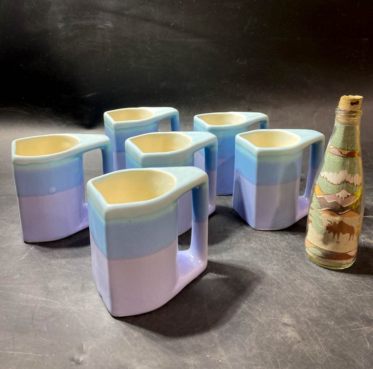 Six Ceramic Mugs by Camilla with Sand Art Bottle