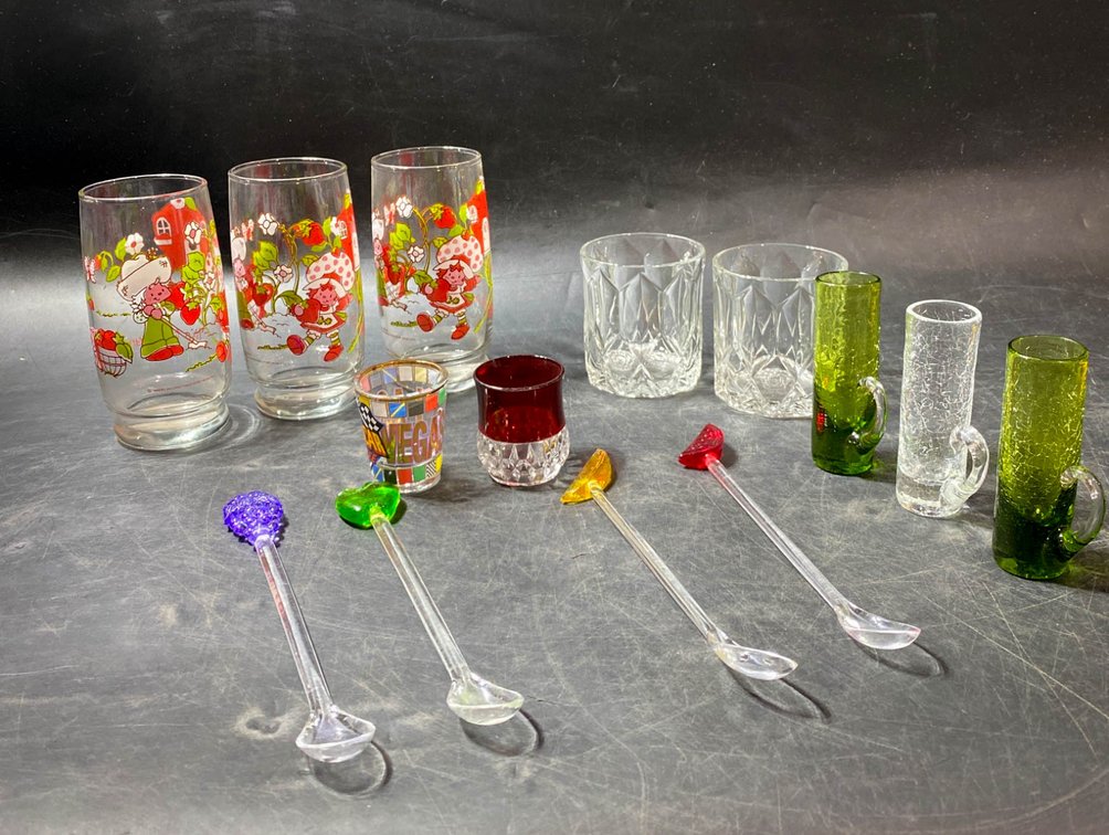 Glassware Collection Including Themed Tumblers, Shot Glasses, and Stirrers