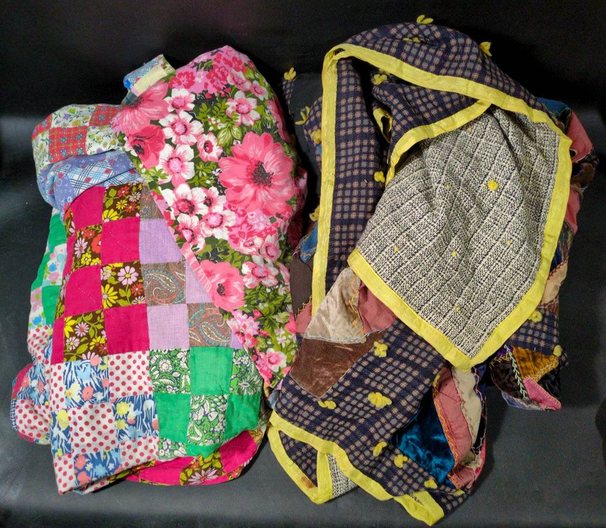 Two Handmade Patchwork Quilts with Floral and Patterned Designs