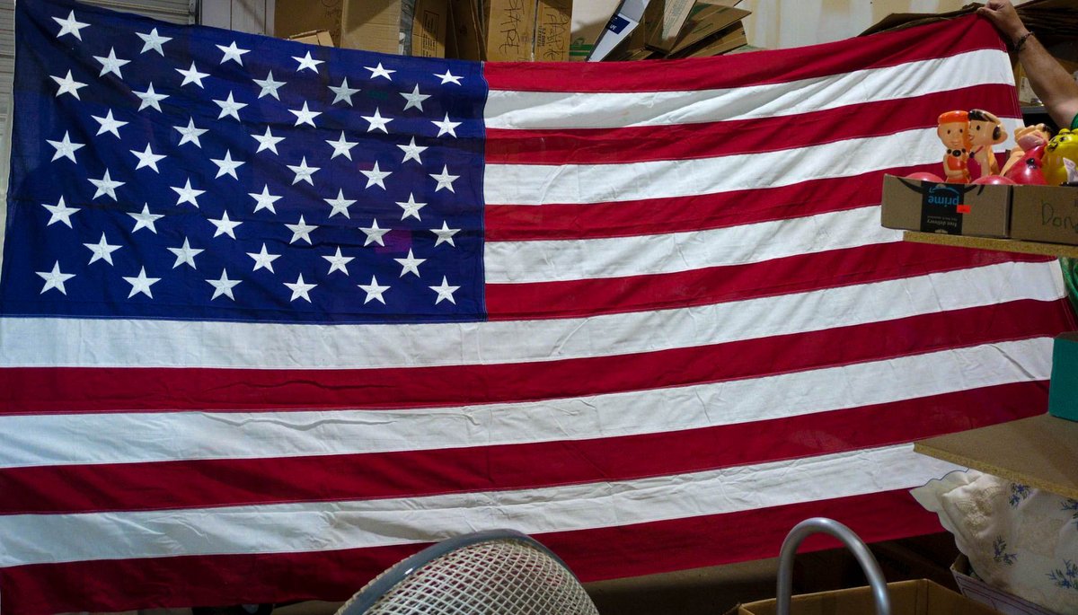 Large 112 x 58; American Flag with Visible Stains