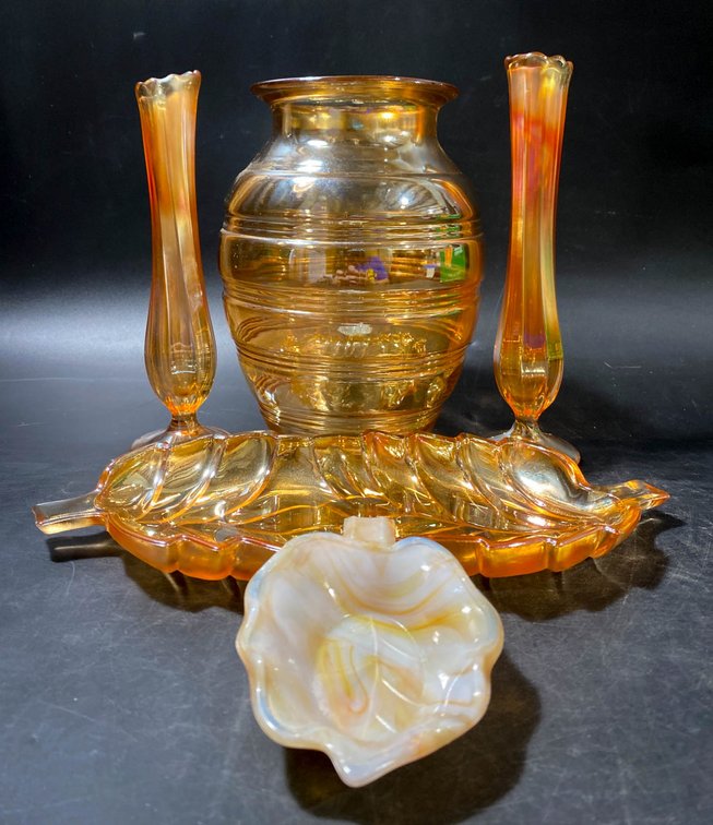 Four Iridescent Glass Items Including Vase, Candleholders, and Dishes