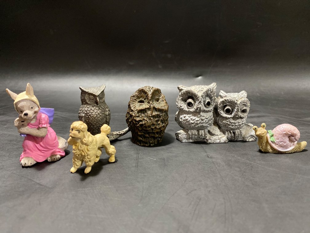 Figurines Featuring Owls, Poodle, Fox, and Snail
