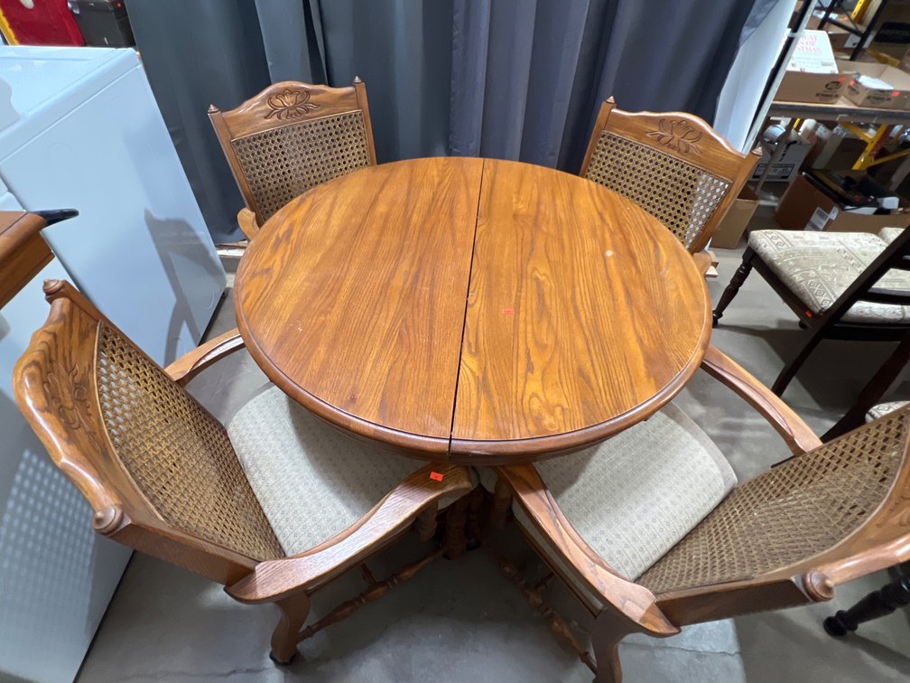 Oak Dining Table with Four Chairs and Cane Detail