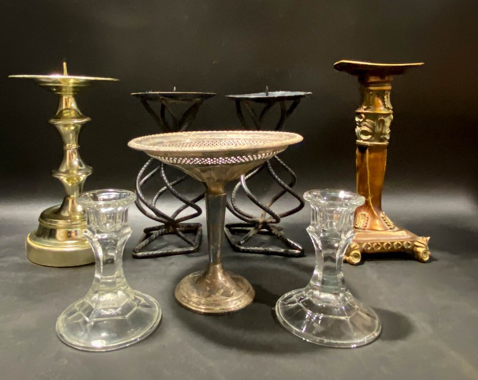 Seven Decorative Candleholders in Various Materials and Styles