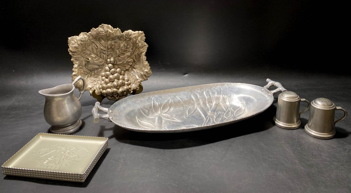Pewter and Metal Tableware with Tray, Plates, and Figurative Details