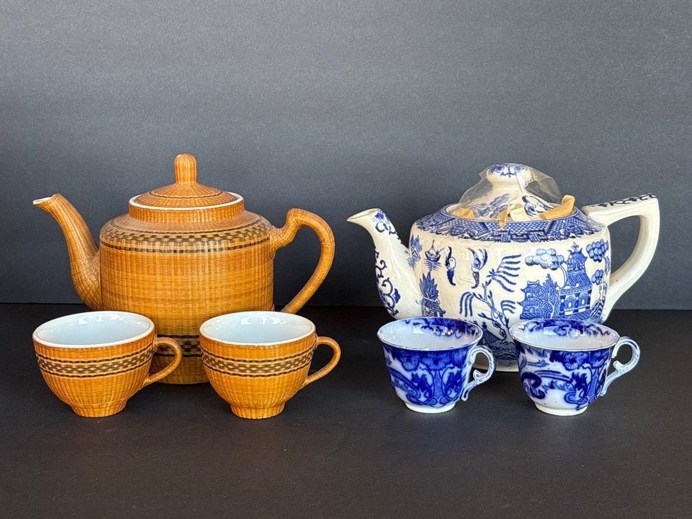 Two Teapot and Cup Sets with Blue Willow and Basketweave Designs