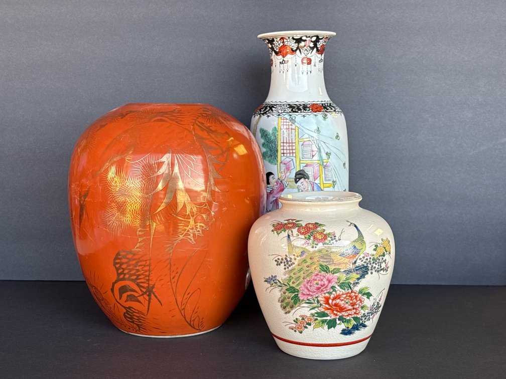 Three Decorated Ceramic Vases with Various Patterns and Motifs