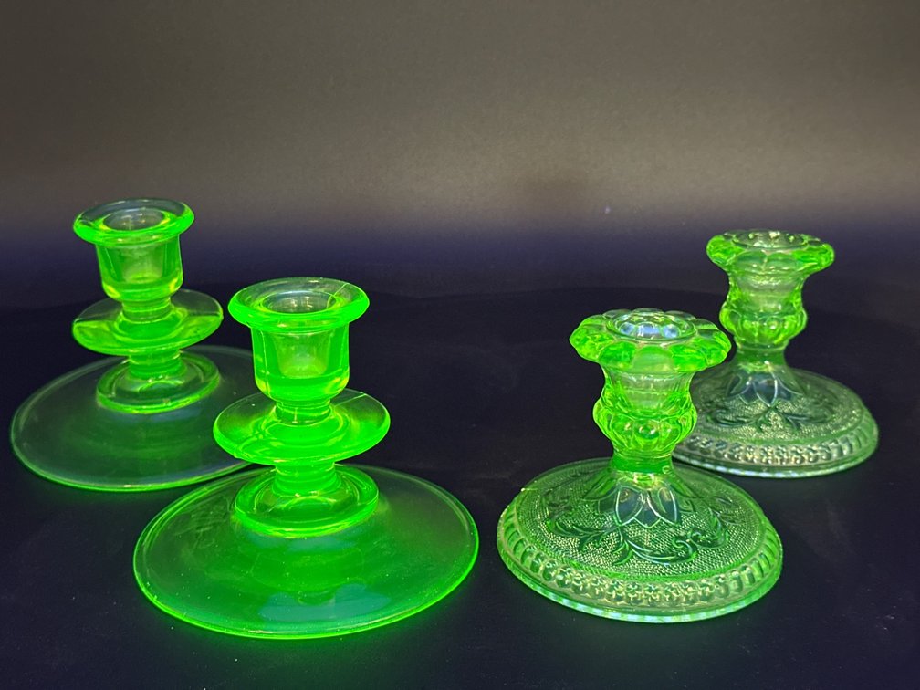 Four Green Uranium Glass Candle Holders