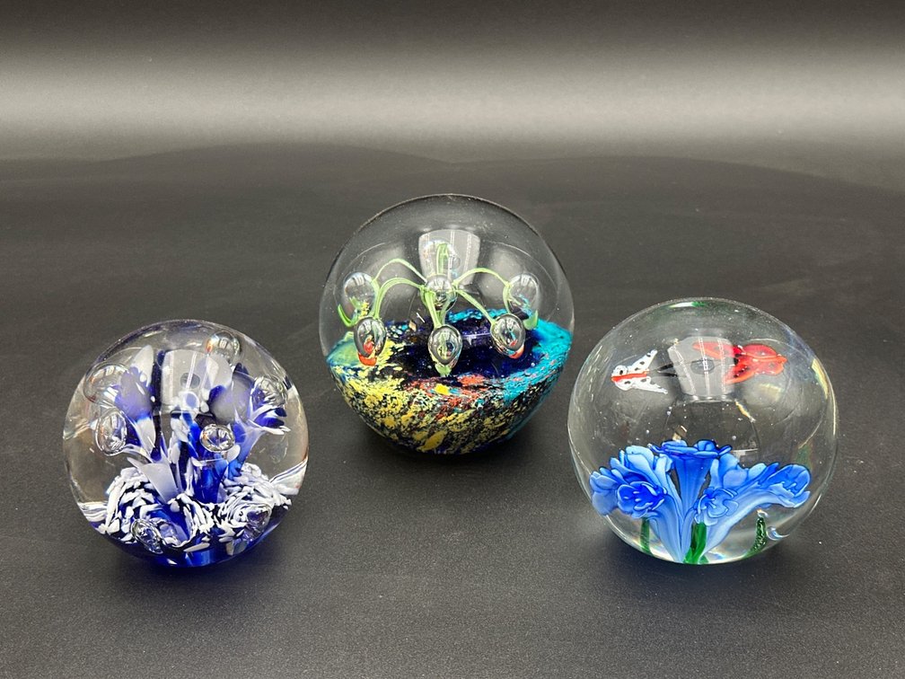 3 Handcrafted Glass Paperweights with Floral and Aquatic Motifs