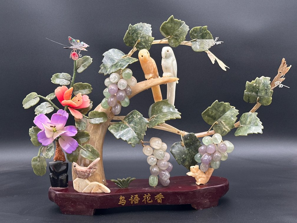 Jade and Stone Sculpture Featuring Birds, Grapes, and Flowers