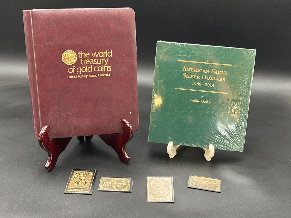 World Treasury of Gold Coins Book with Gold Stamps & American Eagle Silver Dollar Album
