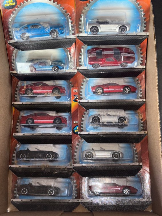 Boxed Set of 12 Ford 1:64 Scale Die-Cast Cars, 2004 and 2010 Series