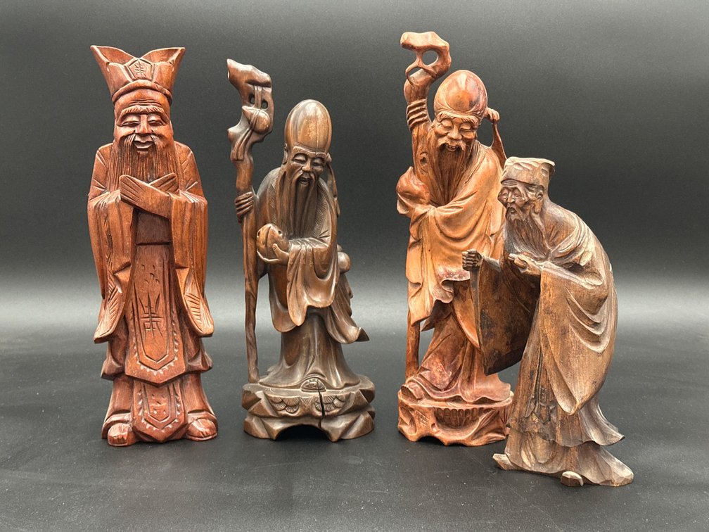 Four Hand-Carved Wooden Figures Depicting Wise Men