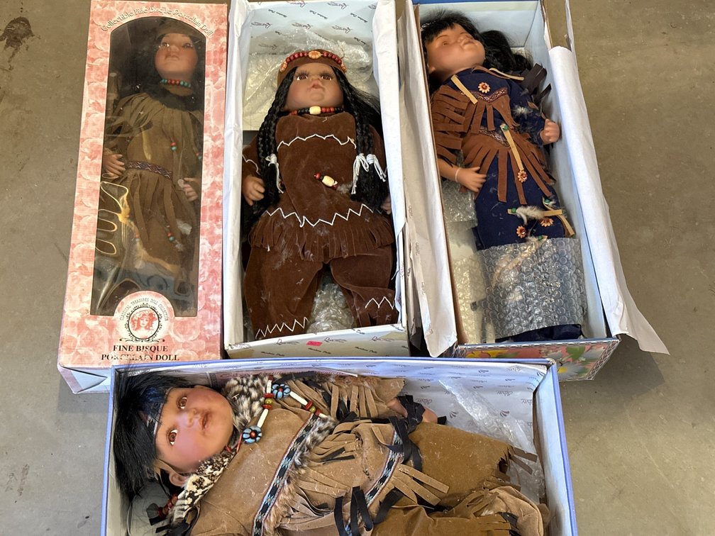Four Native American-Inspired Porcelain Dolls in Original Boxes