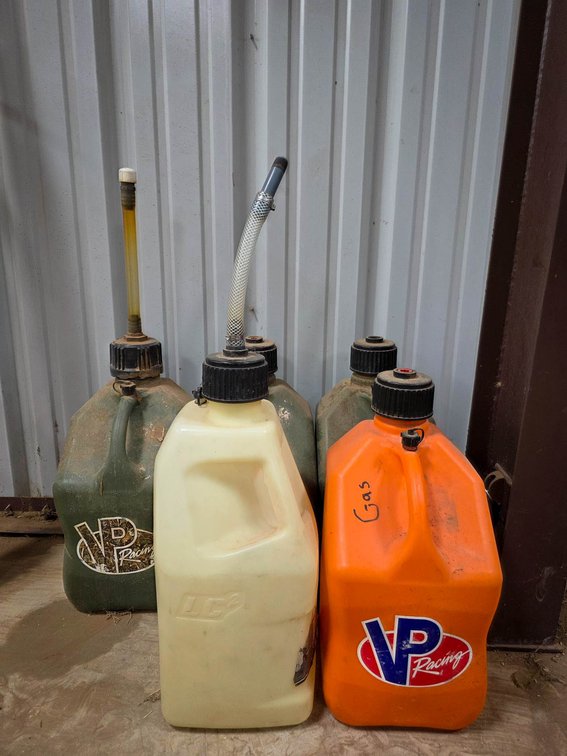 Five VP Racing and LC Fuel Containers