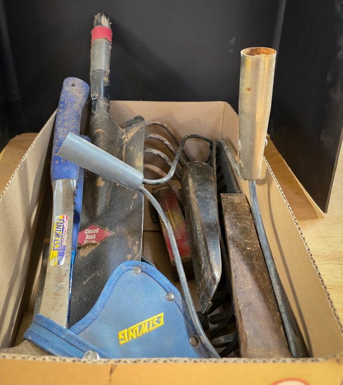 Hand Tools Including Axes, Rakes, and Garden Tools