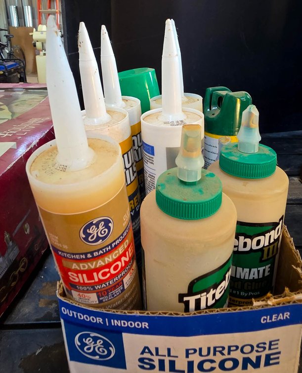 Adhesive and Sealant Lot Including GE Silicone, Liquid Nails, and Titebond Wood Glue