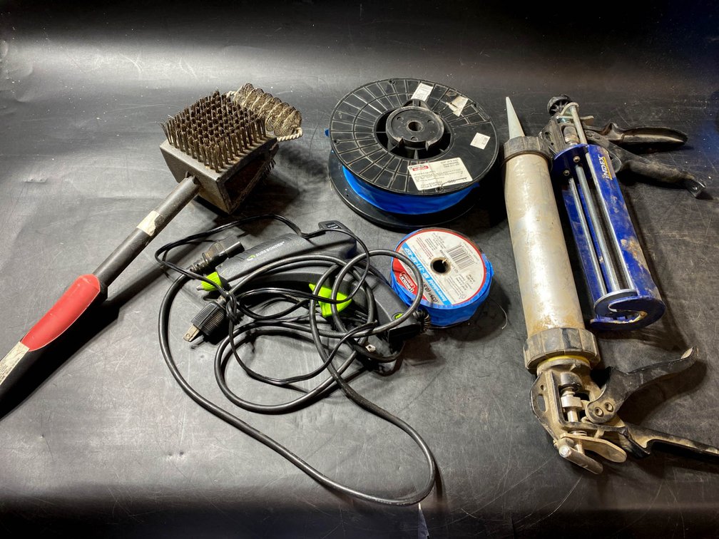 Industrial Tools Including Wire Brushes, Welding Wire, and Caulking Guns