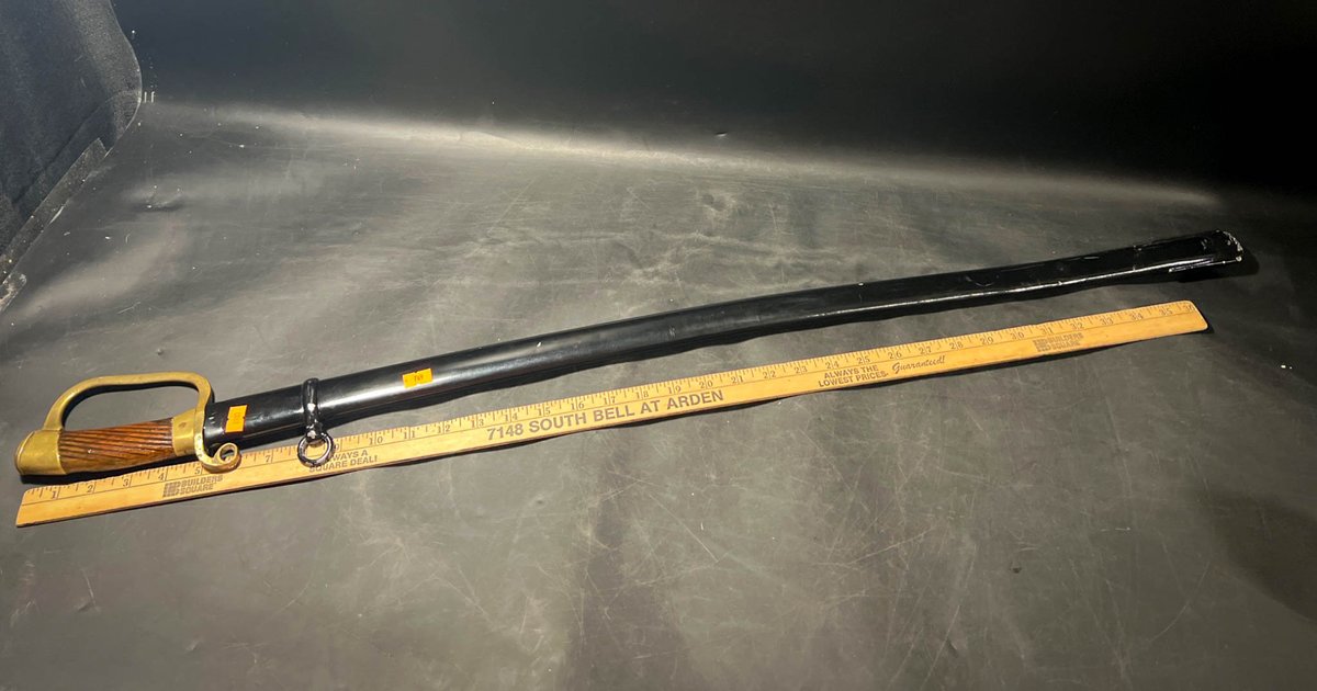 Brass-Handled Saber with Scabbard