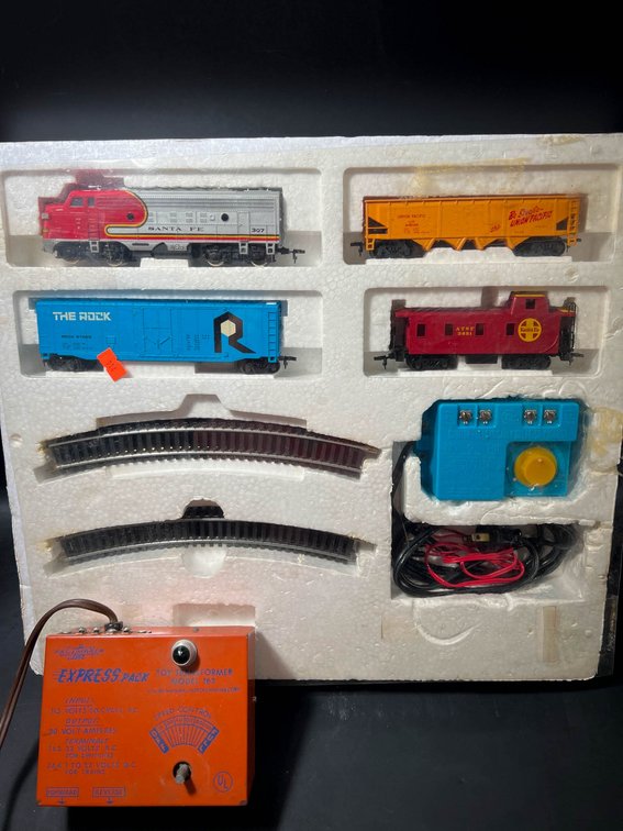 Model Train Set with Locomotive, Cars, Track, and Power Controller