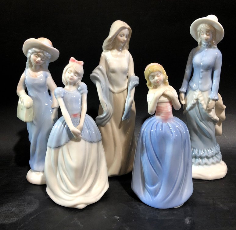 Five Porcelain Figurines Depicting Women in Traditional Attire
