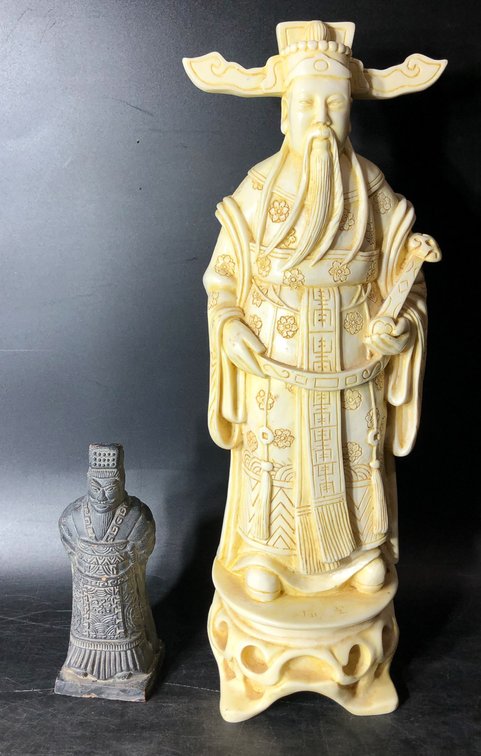 Ivory-Colored Asian Figurine and Dark Stone Statue Set