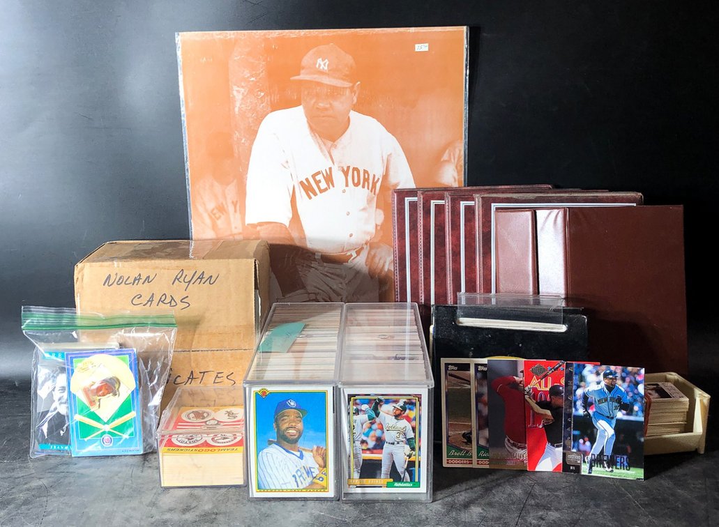 Sports Trading Card Collection Featuring Baseball and Football Cards, Albums, and Posters