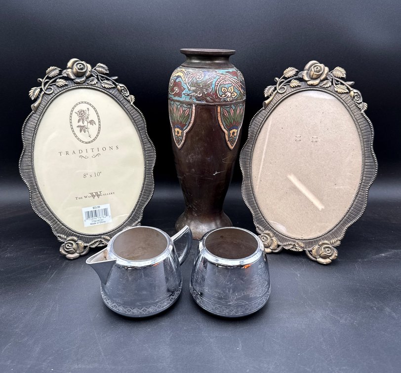 Decorative Lot with Two Photo Frames, Enamel Vase, and Silver-Plated Cream and Sugar Set