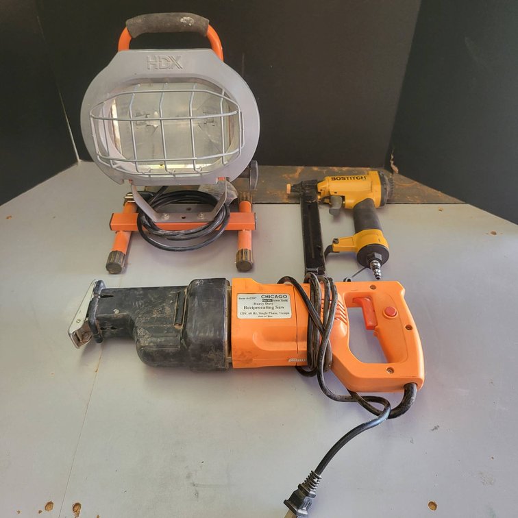 Three Tools: HDX Work Light, Pneumatic Nail Gun, and Chicago Electric Reciprocating Saw