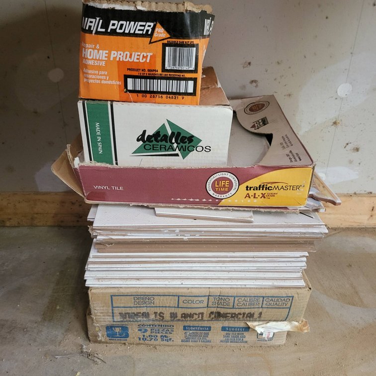 Ceramic and Vinyl Floor Tiles in Original Packaging