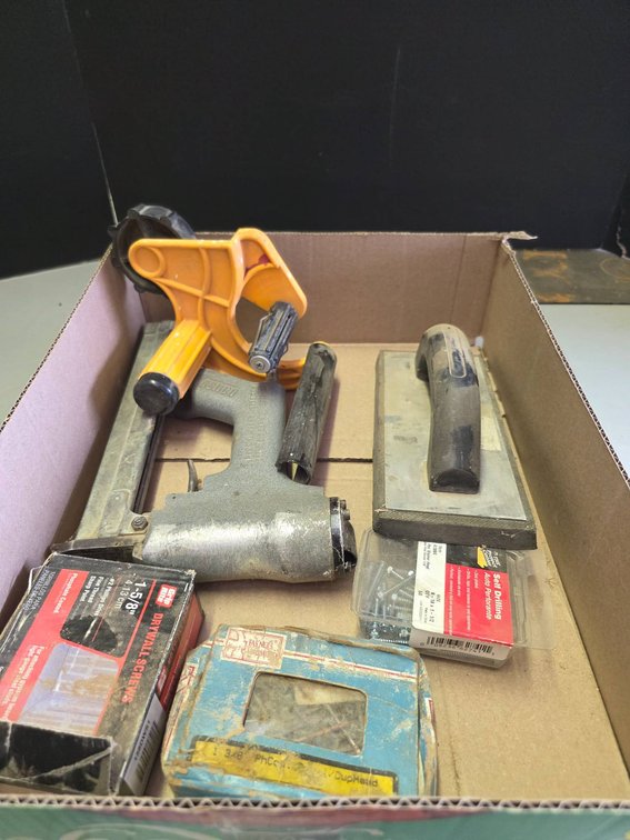 Tools Including Pneumatic Nail Gun, Trowel, and Hardware