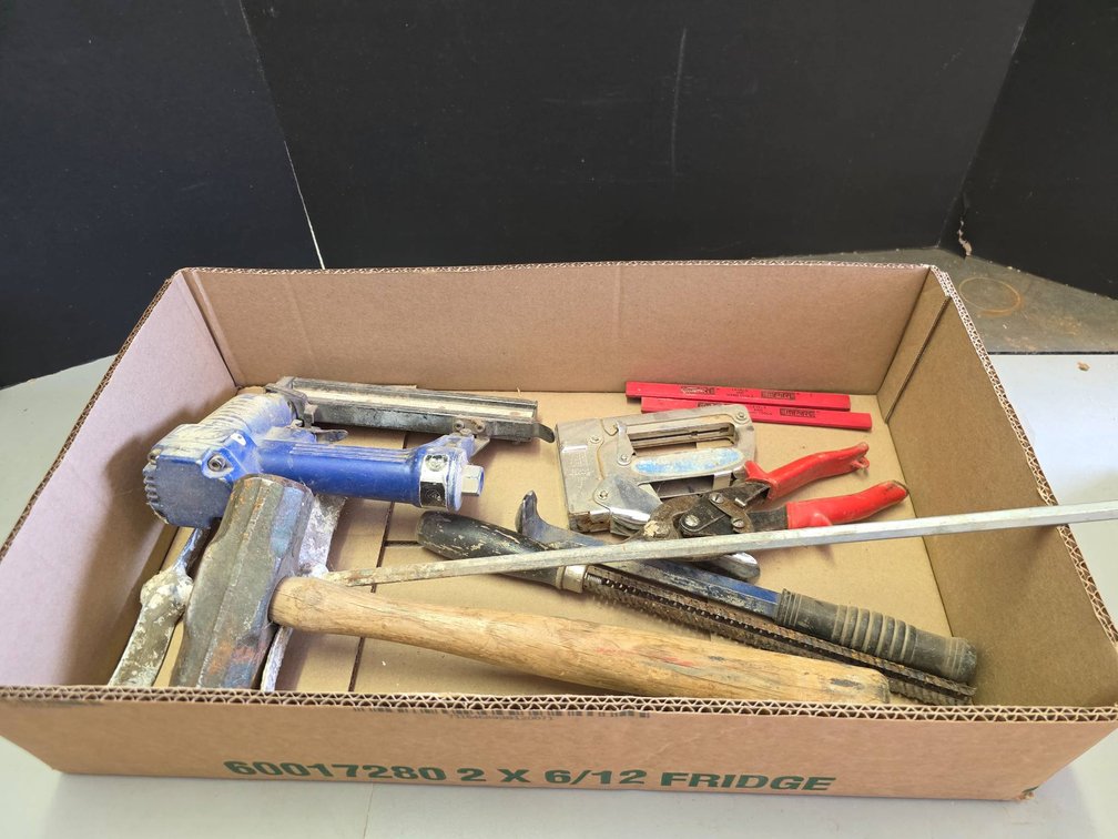 Tools Including Hammer, Staple Gun, and Bolt Cutters